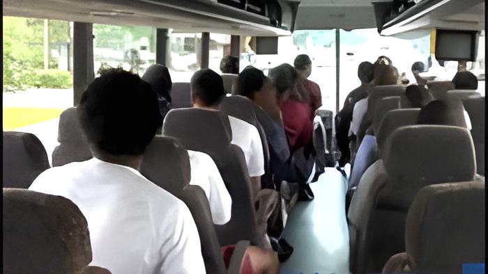 playersinbus.july11.13.jpg